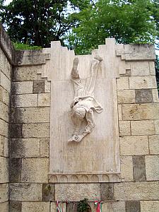 Sculpture of a man falling