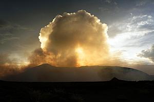 Smoke rising from the crater.