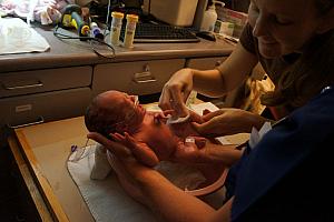 Kelly helping with a bath for the first time.