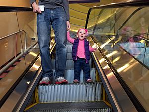 Capri excited for the escalator ride.